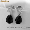 CERCEI eleganti FILATI in AUR ALB de 14k cu 7 pietre Swarovski ALBE ce stralucesc INCREDIBIL si o piatra Swarovski NEAGRA taietura PEAR! Cadou ideal CERCEI eleganti FILATI in AUR ALB de 14k cu 7 pietre Swarovski ALBE ce stralucesc INCREDIBIL si o piatra Swarovski NEAGRA taietura PEAR! Cadou ideal