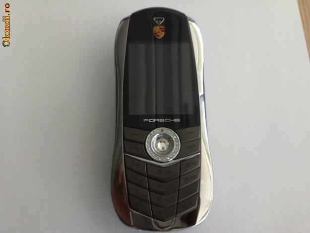 Vertu Porsche Cayman S foto mare