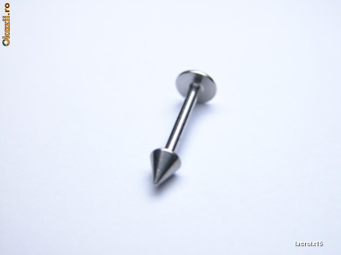 PIERCING DIN OTEL INOXIDABIL foto mare