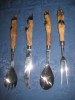 Splendid set tacamuri de vanator din patru piese marca Orangina inox cu manere design copite de animal